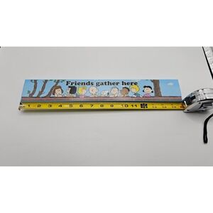 Peanuts "Friends Gather Here" wide wooden sign